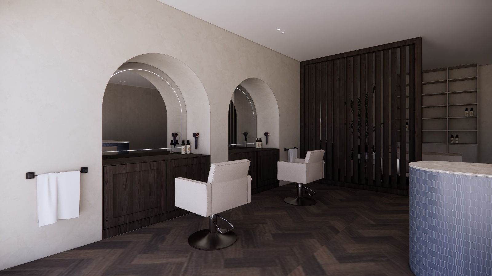 Hair salon with lit arched mirrors and a rounded counter